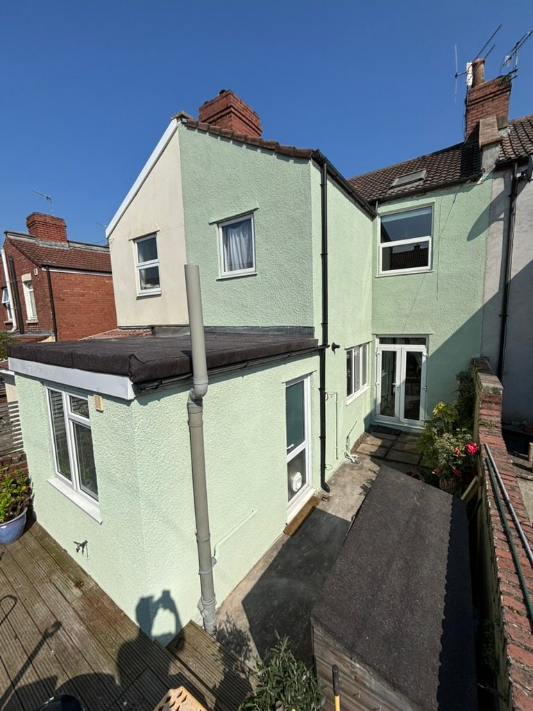 Second view of completed cork spray exterior project